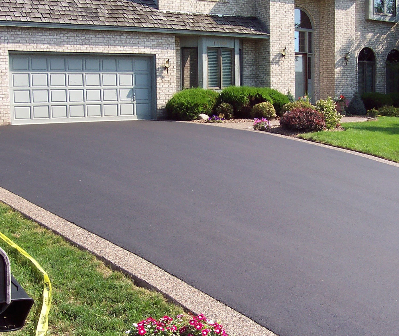 How to Properly Edge Your Asphalt Driveway - Richfield Blacktop