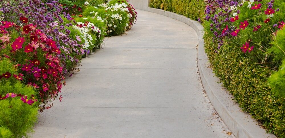 thick should a concrete walkway be