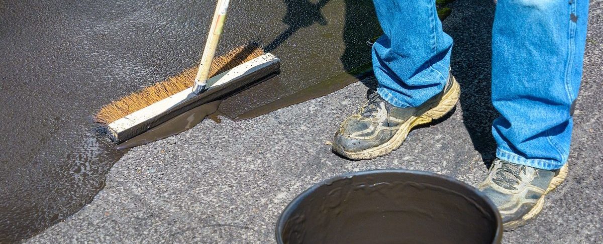 Driveway Sealing Service Cost vs DIY: What Homeowners Need to Know