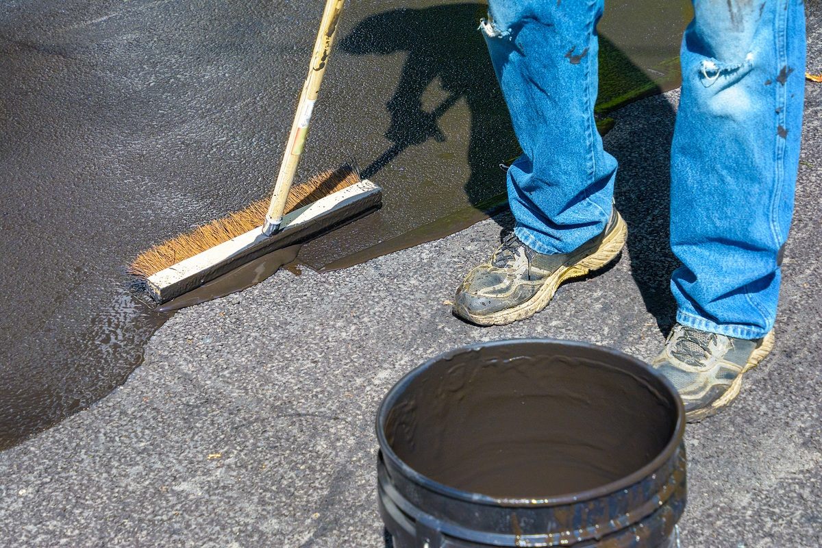 Driveway Sealing Service Cost vs DIY: What Homeowners Need to Know