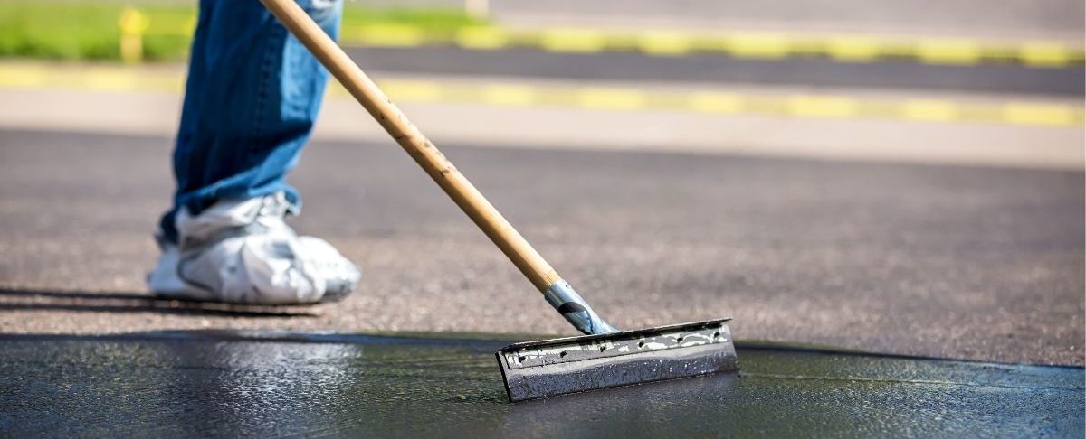 What Is Sealcoating: Cost Benefits for Minnesota Driveways